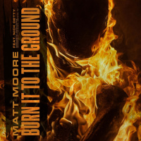 Matt Moore “Burn It to the Ground” single artwork featuring a dramatic figure engulfed in bright orange flames against a dark background.